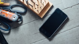 Bryan Wheelock Shares IP Basics for App Developers in New Article | IP Law Firm | Harness IP Image of mobile device