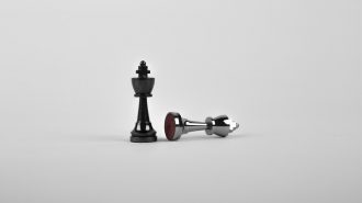 Competitor Influence on the Conduct of the Patent Dance and Litigation | IP Law Firm | Harness IP photo of chess pieces representing biosimilar competitive dynamics