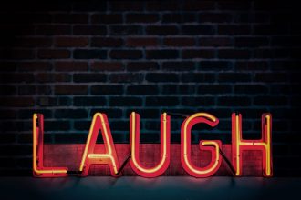 Beyoncé v. Feyonce — If Enough Consumers Get the Joke, There May not be a Likelihood of Confusion | IP Law Firm | Harness IP image of neon sign saying laugh