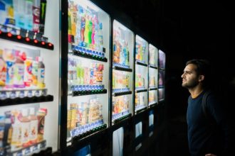 Bryan Wheelock Discusses IP Rights for Kiosks and Vending Machines in Vending Times Article | IP Law Firm | Harness IP Man considering ip rights of vending machines